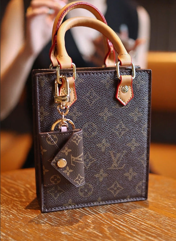 Keychain phone bag crafted by a celebrity designer